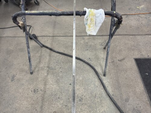 Custom fabricated side step modeling for a 1936 Buick